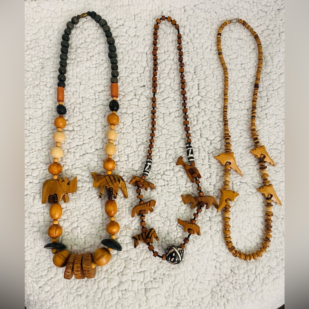 Hand carved wood animal bead necklace.